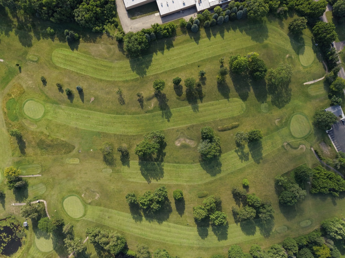Overlooking view of Brookwood Golf Course with water features